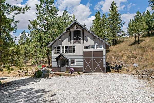 5.8 Acres of Land with Home for Sale in Nine Mile Falls, Washington