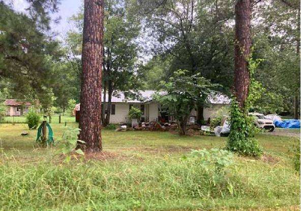 4 Acres of Land with Home for Sale in Sulphur Rock, Arkansas