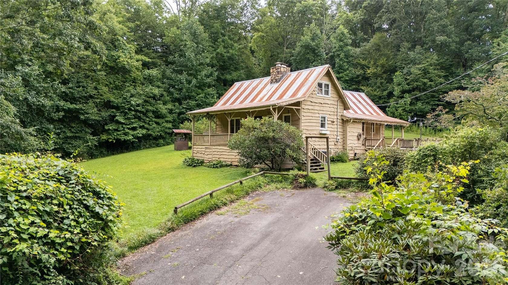 10.8 Acres of Land with Home for Sale in Newland, North Carolina