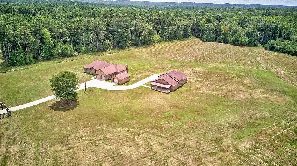 10.8 Acres of Land with Home for Sale in Opelika, Alabama