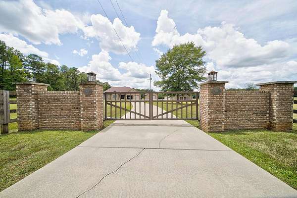 10.8 Acres of Land with Home for Sale in Opelika, Alabama