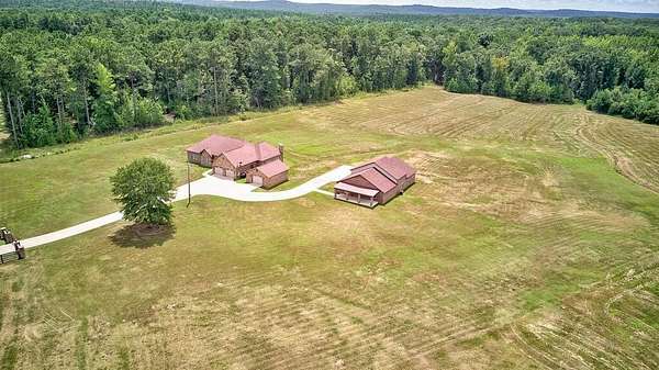 10.8 Acres of Land with Home for Sale in Opelika, Alabama