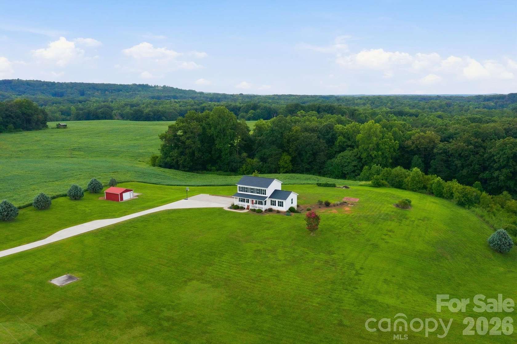 3.59 Acres of Land with Home for Sale in Hiddenite, North Carolina
