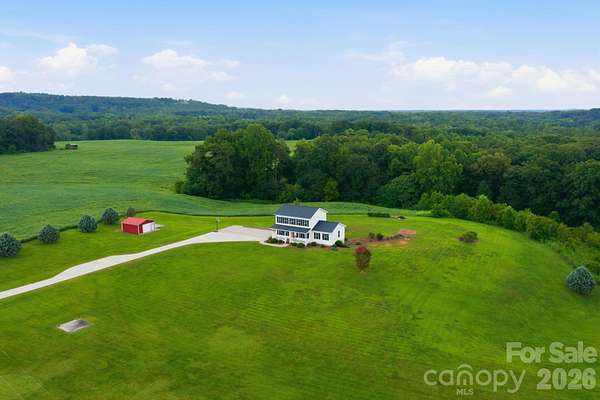 3.59 Acres of Land with Home for Sale in Hiddenite, North Carolina
