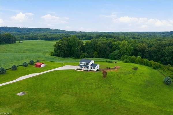 3.59 Acres of Land with Home for Sale in Hiddenite, North Carolina