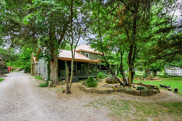 5.6 Acres of Land with Home for Sale in Carthage, Missouri