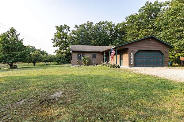 1.56 Acres of Land with Home for Sale in Cheboygan, Michigan