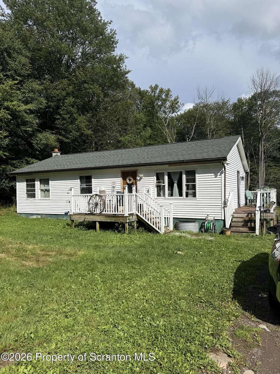 10 Acres of Land with Home for Sale in Forest City, Pennsylvania