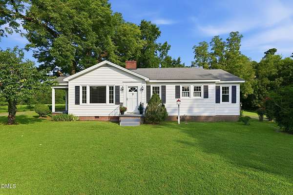 7.27 Acres of Land with Home for Sale in Liberty, North Carolina