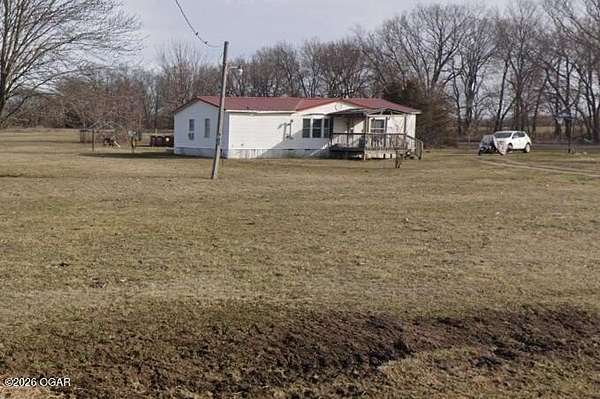 2.8 Acres of Land with Home for Sale in Carl Junction, Missouri