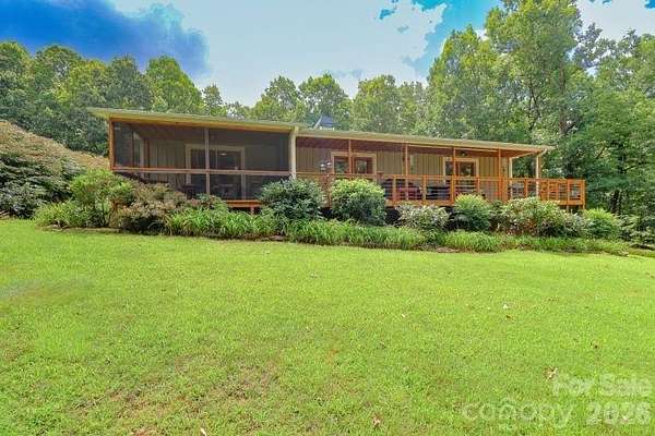 6 Acres of Land with Home for Sale in Cedar Mountain, North Carolina
