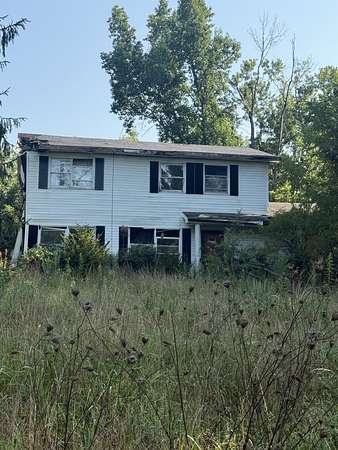 11.5 Acres of Land with Home for Auction in Rock Island, Tennessee