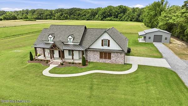 12.2 Acres of Recreational Land with Home for Sale in Canton, Mississippi