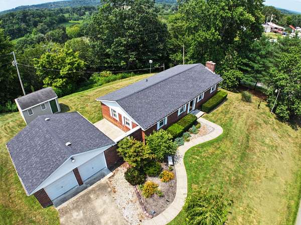 1.5 Acres of Land with Home for Sale in Irvine, Kentucky