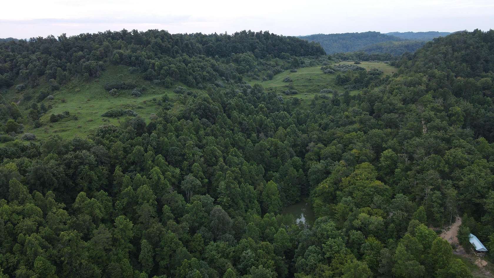 212 Acres of Recreational Land with Home for Sale in Salyersville, Kentucky