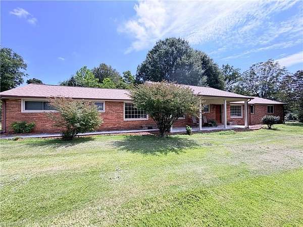 1.9 Acres of Land with Home for Sale in Roaring River, North Carolina
