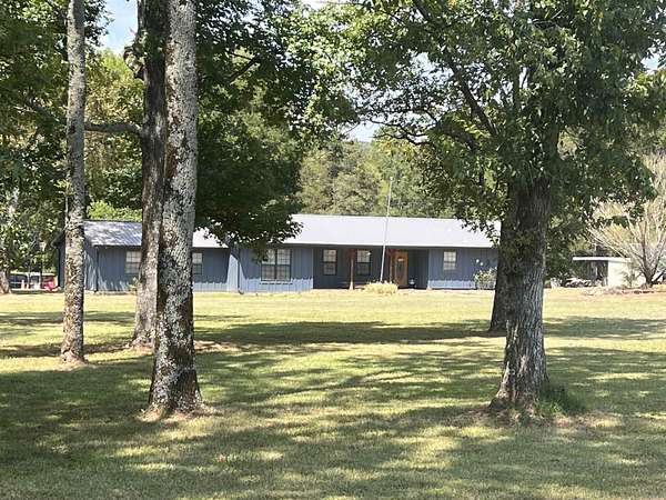 5 Acres of Land with Home for Sale in Pottsville, Arkansas