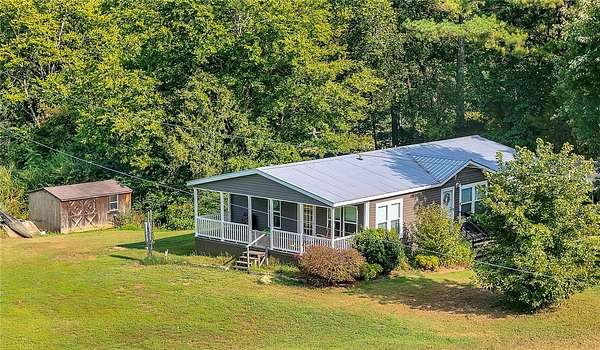 11 Acres of Land with Home for Sale in Russellville, Arkansas