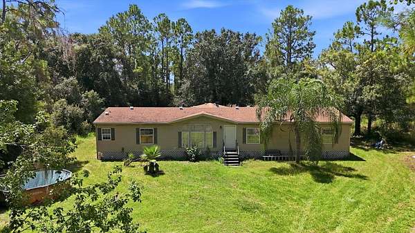 6.78 Acres of Land with Home for Sale in Myakka City, Florida