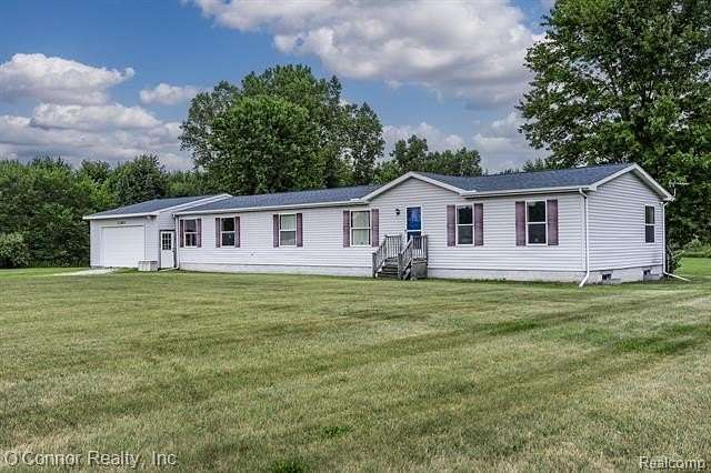 2.5 Acres of Land with Home for Sale in Marysville, Michigan