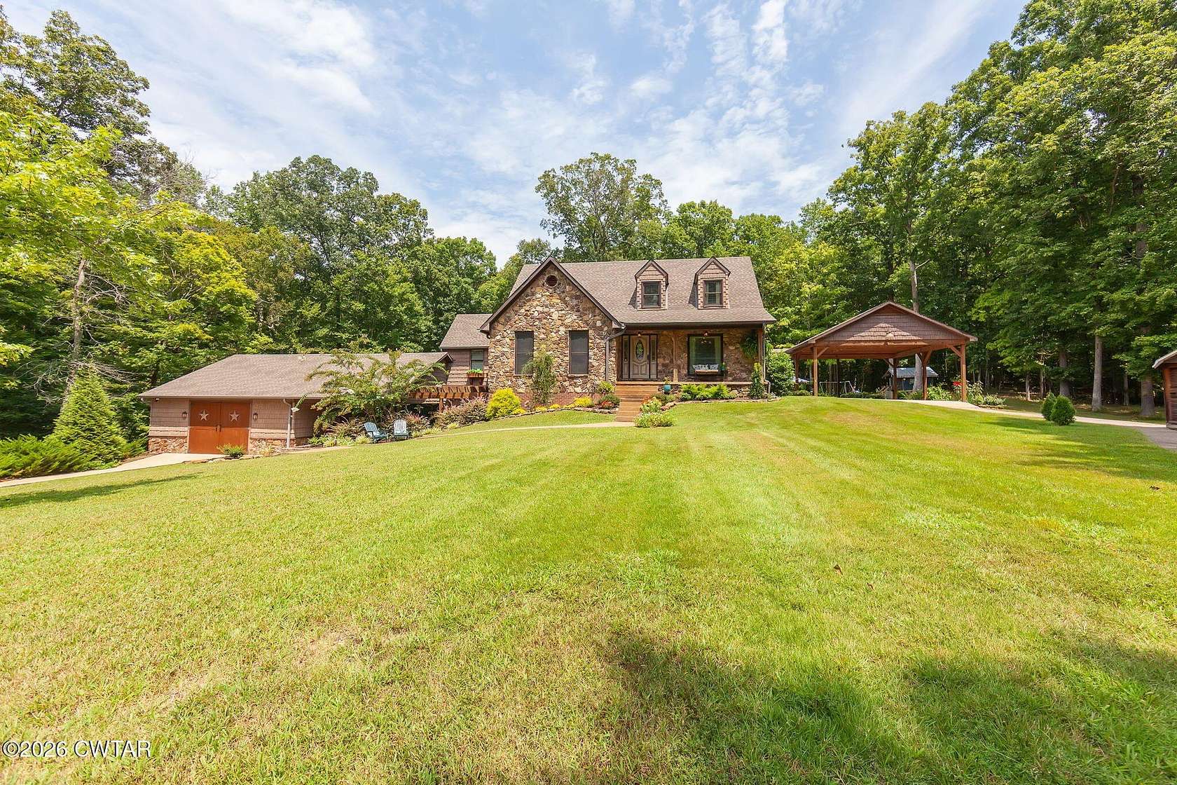 20.7 Acres of Recreational Land with Home for Sale in Beech Bluff, Tennessee