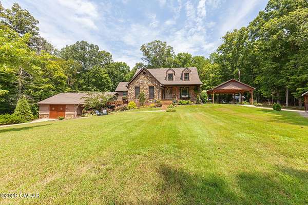 20.7 Acres of Recreational Land with Home for Sale in Beech Bluff, Tennessee