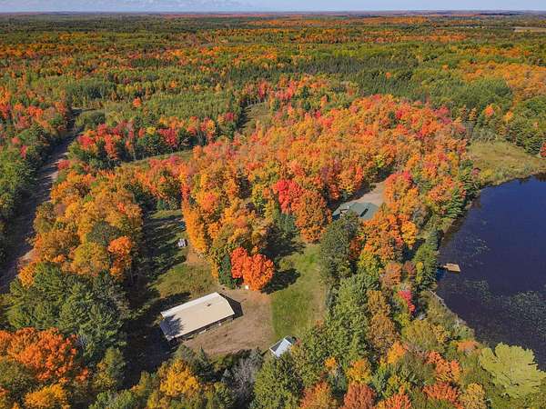 30 Acres of Recreational Land with Home for Sale in Fifield, Wisconsin