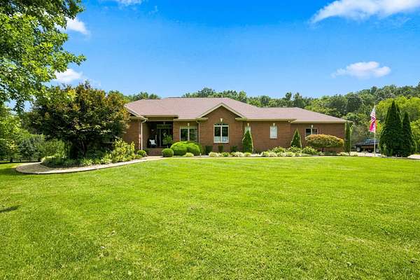 2.33 Acres of Land with Home for Sale in Burns, Tennessee