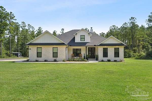 2.5 Acres of Land with Home for Sale in Pace, Florida