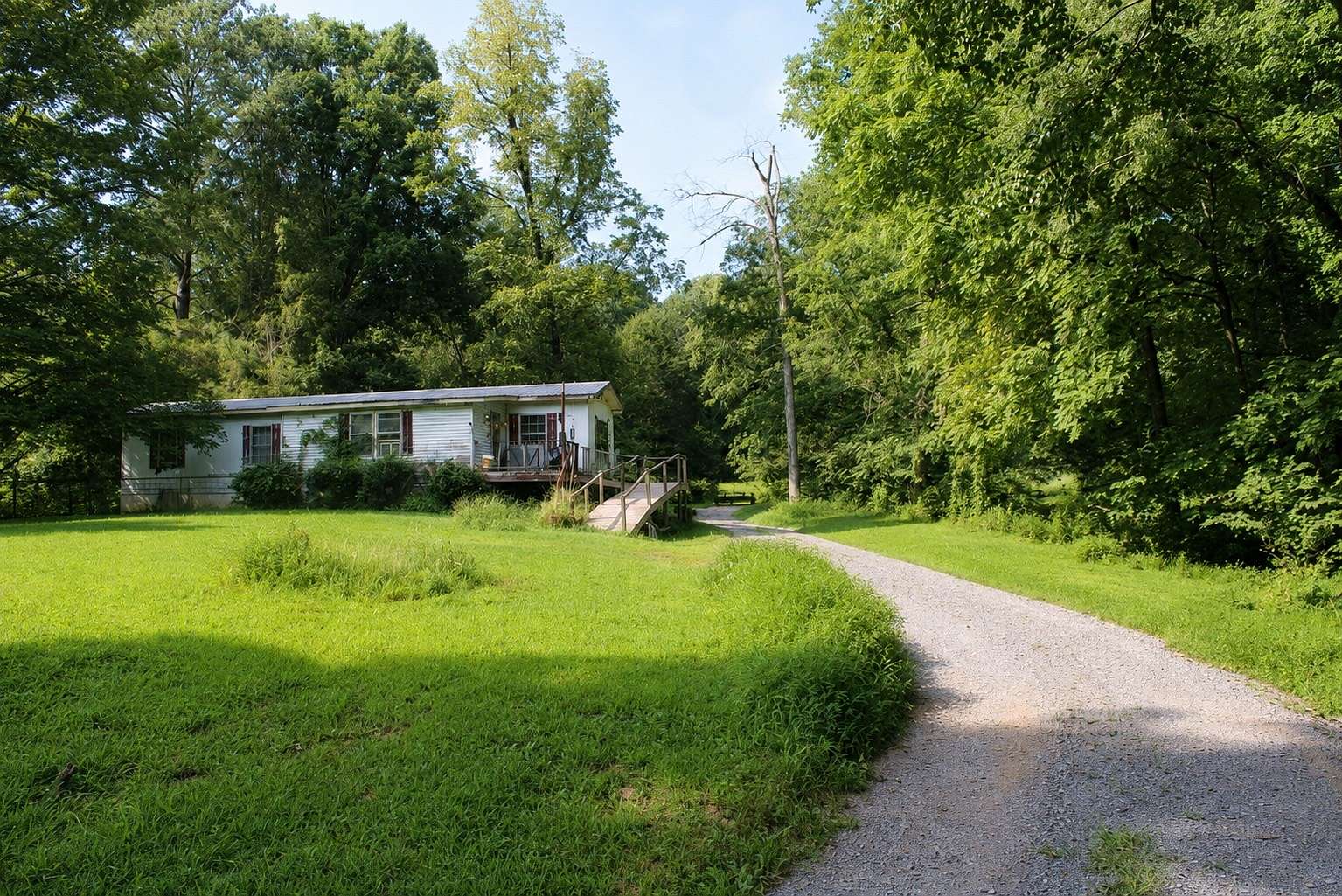 5.5 Acres of Land with Home for Sale in Pleasant View, Tennessee