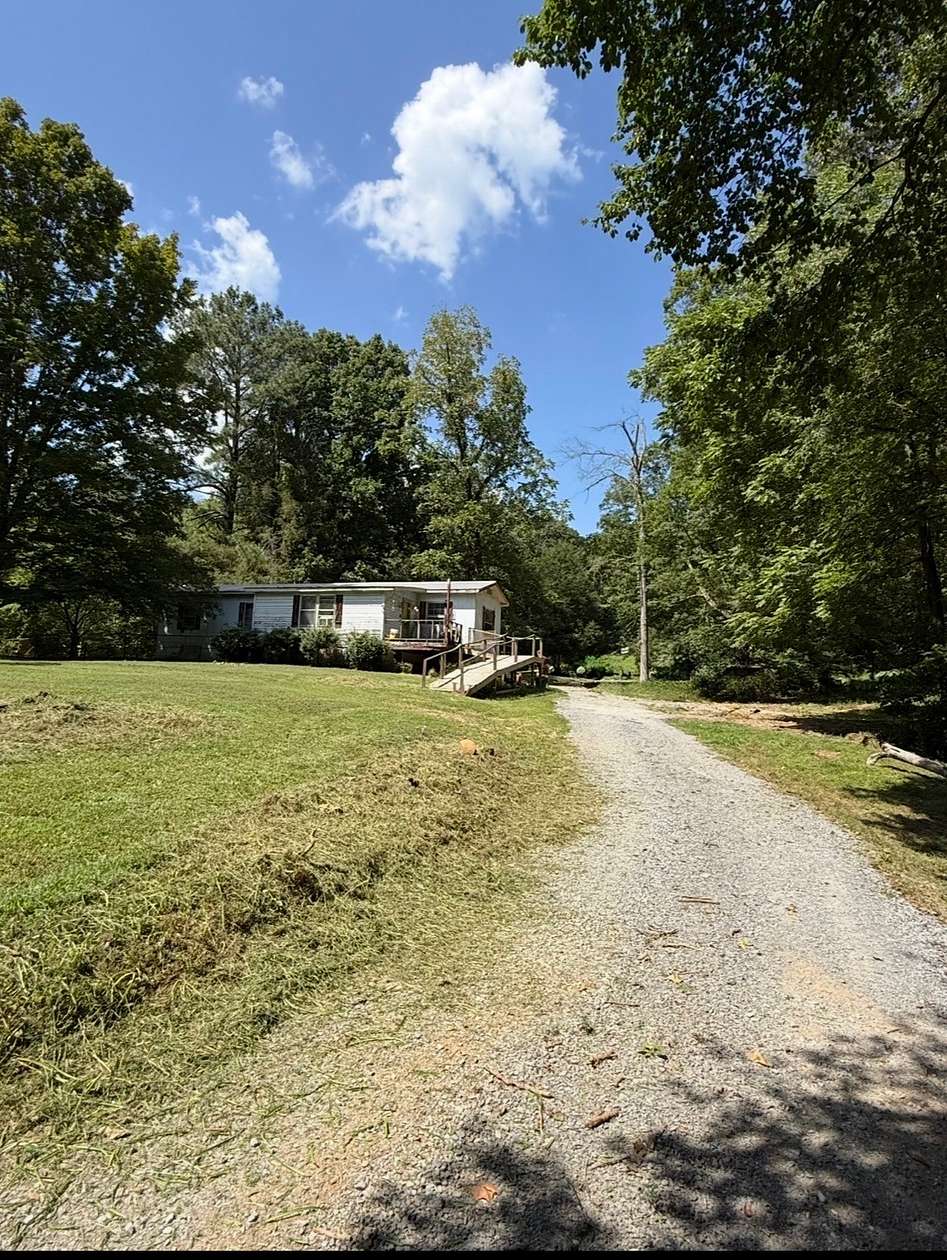 5.5 Acres of Land with Home for Sale in Pleasant View, Tennessee