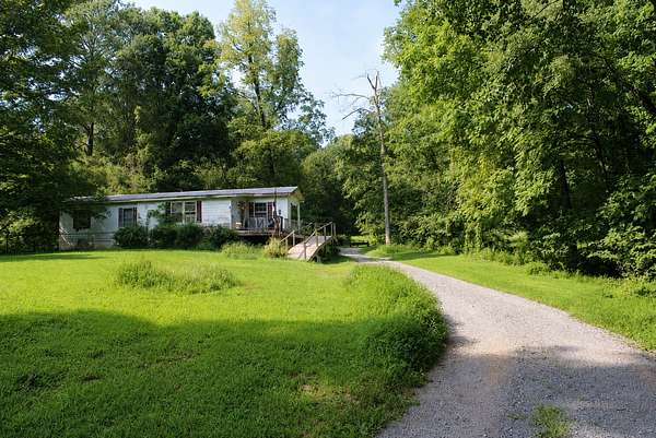 5.5 Acres of Land with Home for Sale in Pleasant View, Tennessee