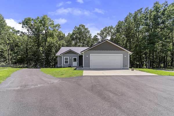 10 Acres of Land with Home for Sale in Strafford, Missouri