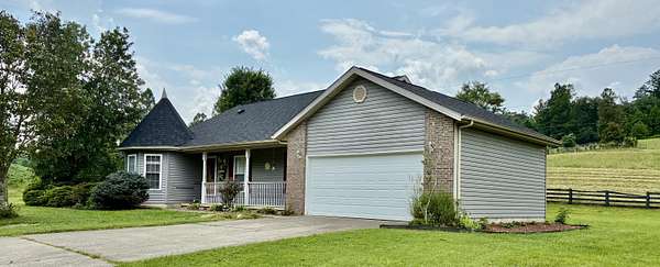 10 Acres of Land with Home for Sale in Campton, Kentucky