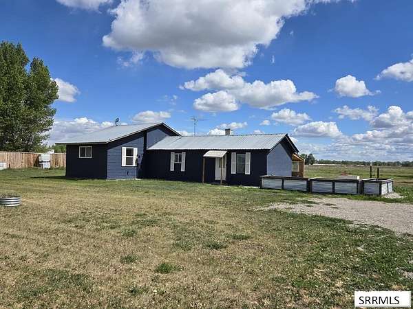 4.77 Acres of Land with Home for Sale in Rigby, Idaho