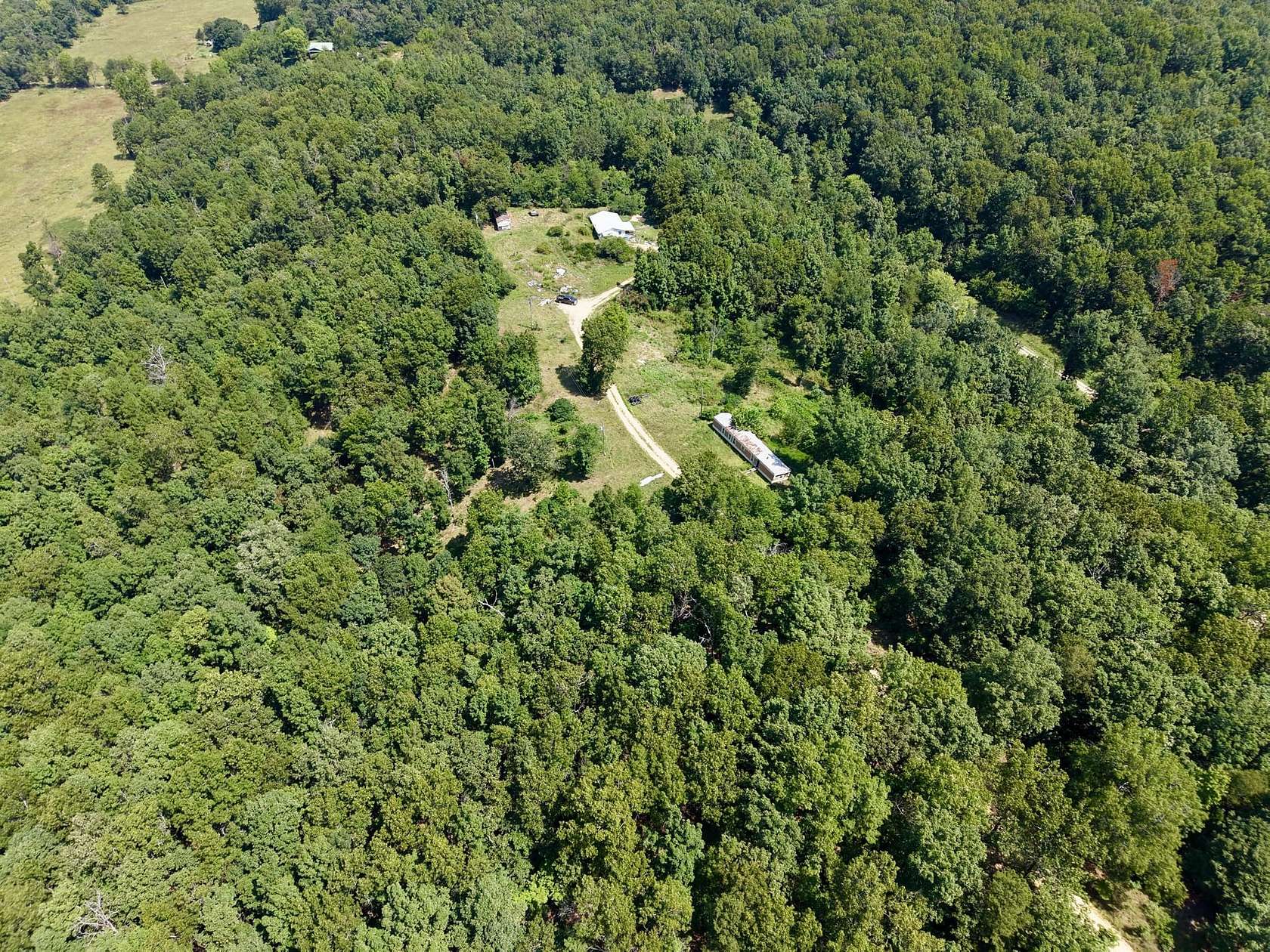10.4 Acres of Recreational Land with Home for Sale in Van Buren, Missouri
