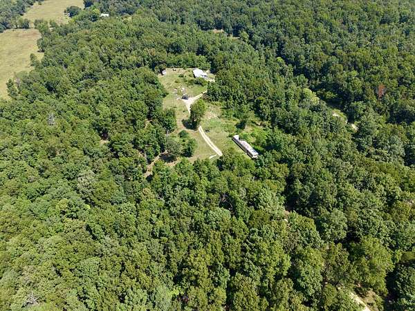 10.4 Acres of Recreational Land with Home for Sale in Van Buren, Missouri