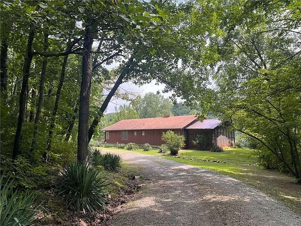 50.6 Acres of Recreational Land with Home for Sale in St. Joseph, Missouri
