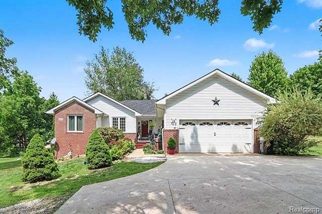 2.5 Acres of Land with Home for Sale in Marion Township, Michigan