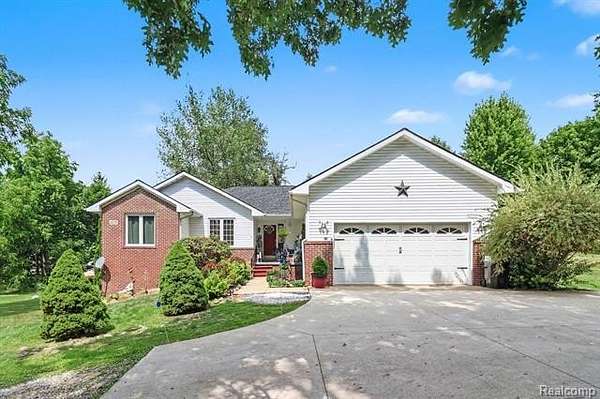 2.5 Acres of Land with Home for Sale in Marion Township, Michigan
