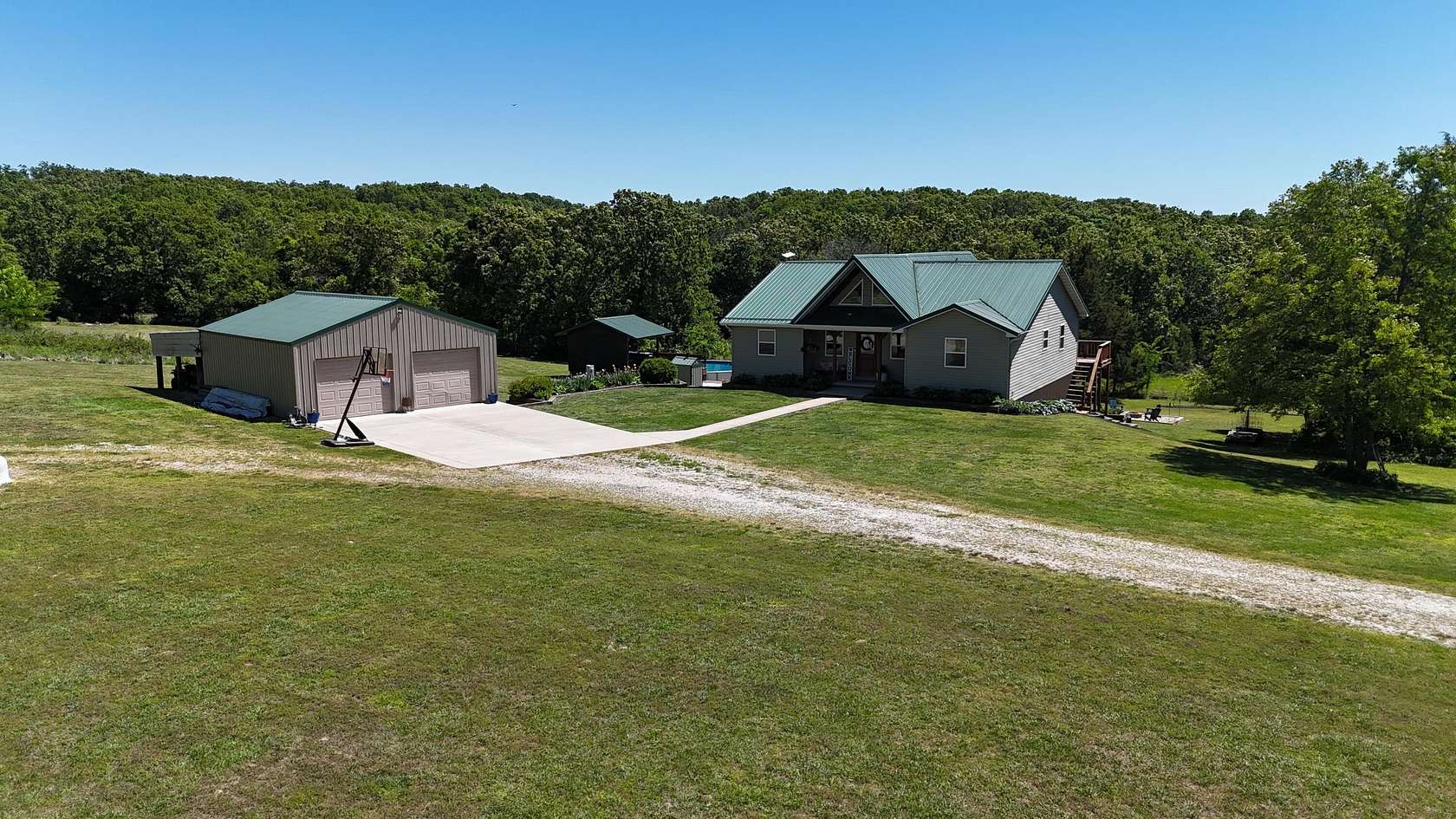 15 Acres of Recreational Land with Home for Sale in Hartville, Missouri
