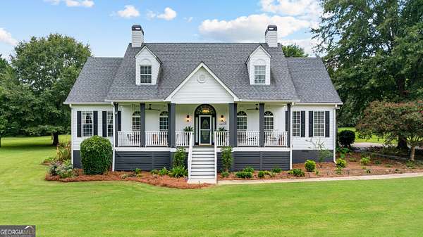 4.89 Acres of Land with Home for Sale in Sharpsburg, Georgia