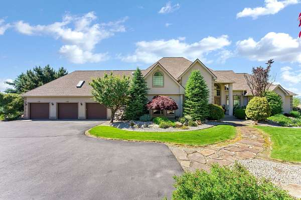 5.3 Acres of Land with Home for Sale in Liberty Lake, Washington