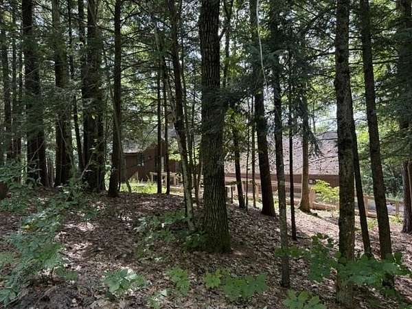 1.5 Acres of Land with Home for Sale in Holderness, New Hampshire
