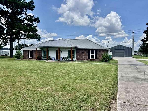 1.5 Acres of Land with Home for Sale in Moss Bluff, Louisiana