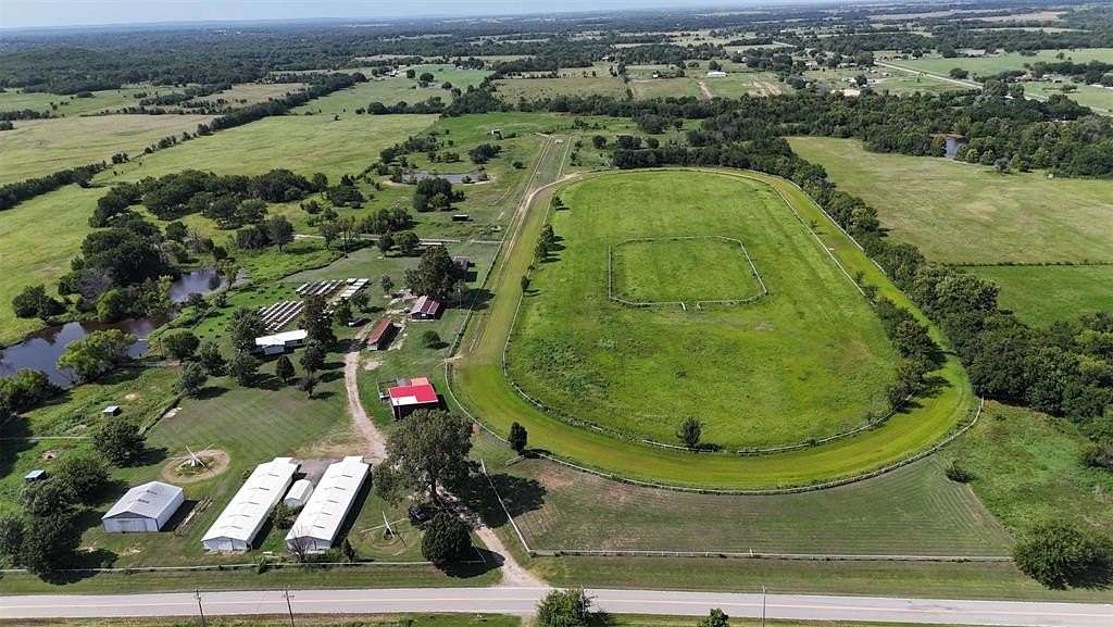 58 Acres of Land with Home for Sale in Henryetta, Oklahoma