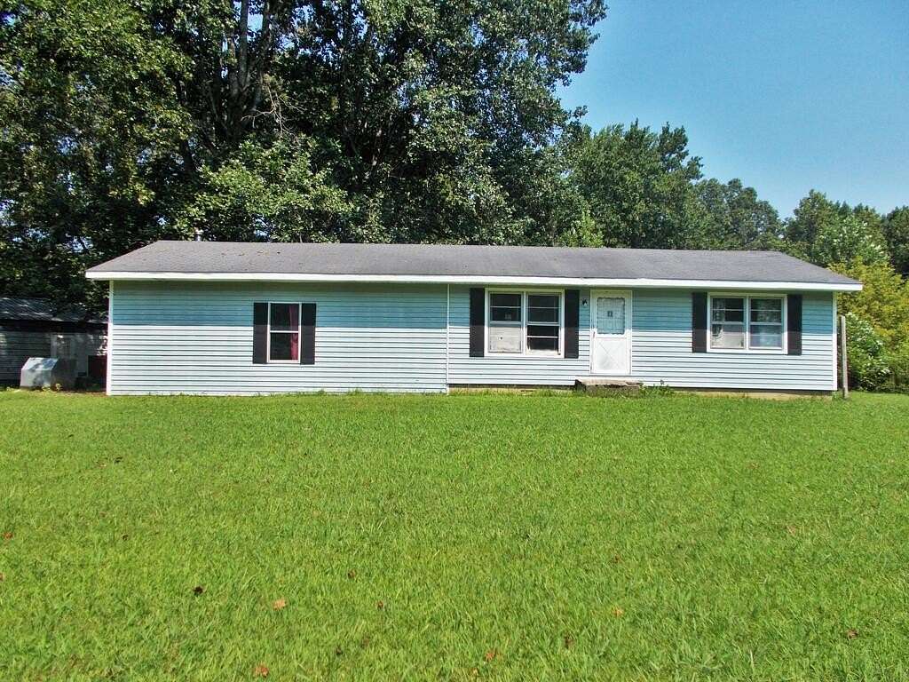 2.5 Acres of Land with Home for Sale in Hollow Rock, Tennessee