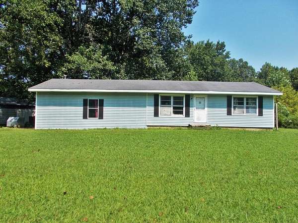 2.5 Acres of Land with Home for Sale in Hollow Rock, Tennessee