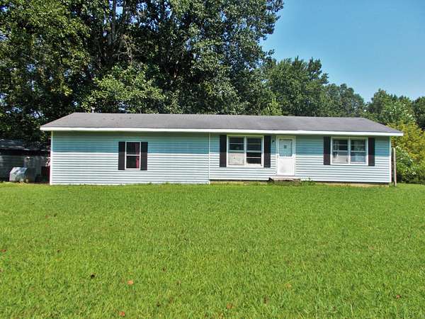2.5 Acres of Land with Home for Sale in Hollow Rock, Tennessee