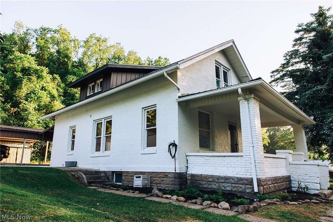 9 Acres of Land with Home for Auction in Coshocton, Ohio